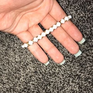 white and gold beaded bracelet